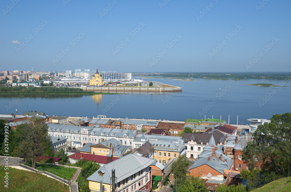 Nizhny Novgorod, Russia - August 19, 2018: View of the Arrow - the confluence of the Oka and Volga rivers and Alexander Nevsky Cathedral on a Sunny summer day