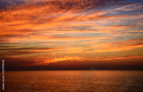 Beautiful cloudscape over the sea after sunset.