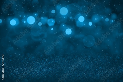 light blue fantastic bright glitter lights defocused bokeh abstract background with falling snow flakes fly, holiday mockup texture with blank space for your content