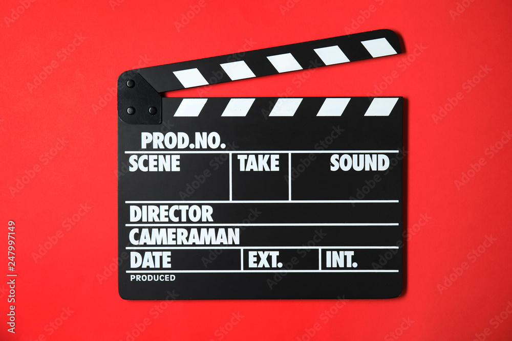 Clapperboard on color background, top view. Cinema production