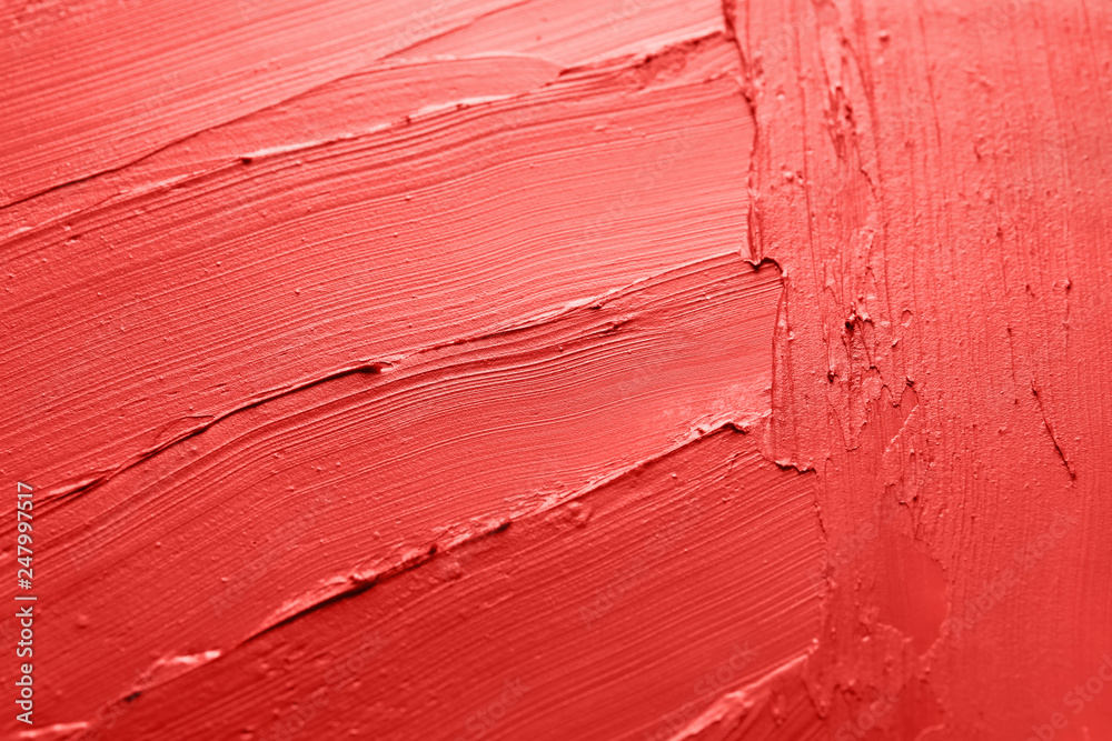 Red lipstick smears as background, closeup. Cosmetic product Red lipstick smears as background, closeup. Cosmetic product