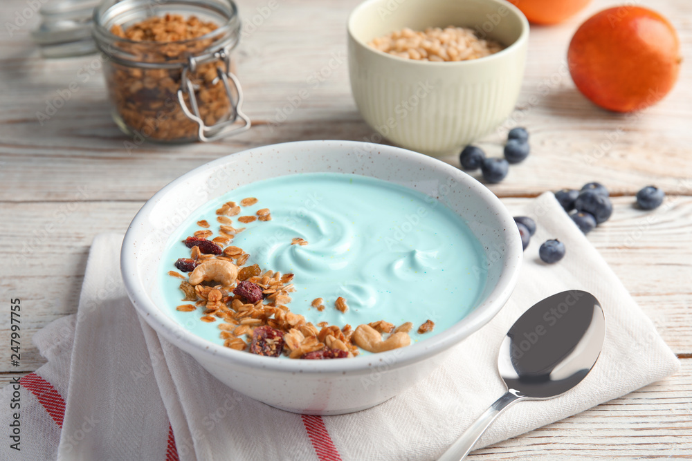 Bowl of spirulina smoothie served for breakfast on table Bowl of spirulina smoothie served for breakfast on table
