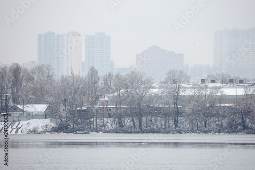 Winter is cloudy weather. Industrial zone in the southern suburbs of Kyiv on the right bank of the Dnipro River. Ukraine Feb. 6, 2019 photo