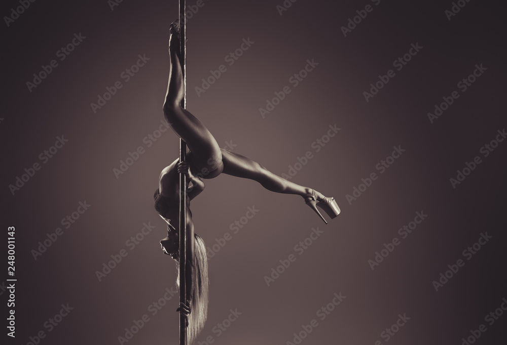 Woman poledancing