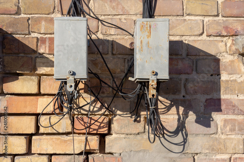 Antique phone cable connection box. Background with comunications topic. photo