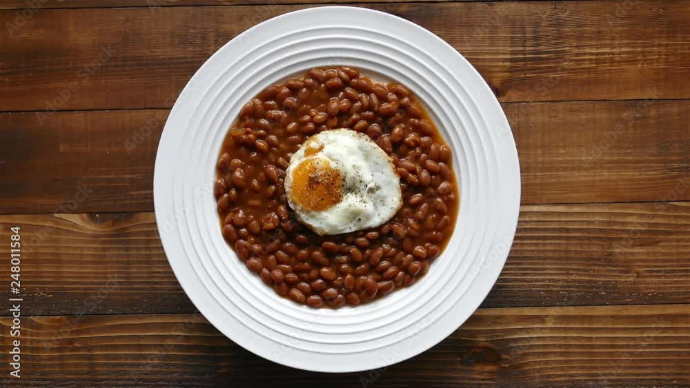 Rotating Hot Beans With Egg On Plate Rotating Hot Beans With Egg On Plate