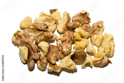 Close-up of walnut. The fruits of walnut. On white background. Isolated.
