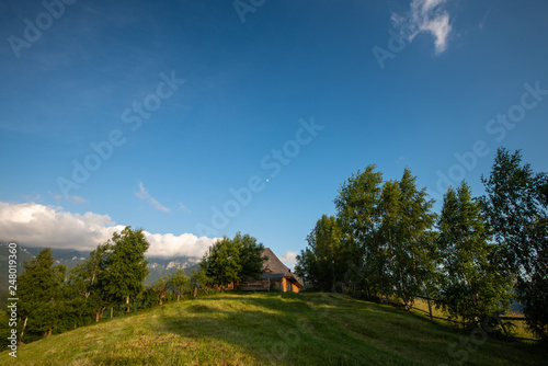 Obraz na płótnie Romanian traditional home made from wood in the Carpathian mountains in Transylvanian village w salonie