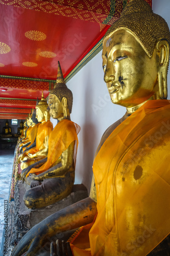 Buddha statues in Wat Pho, Bangkok, Thailand photo