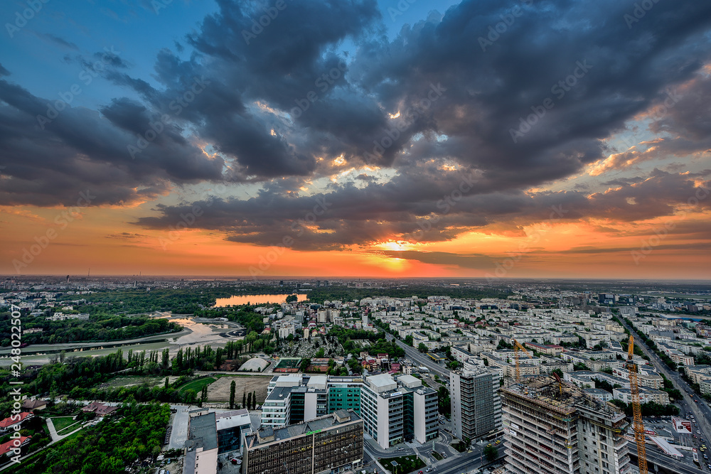 sunset over the Bucharest city in Romania 