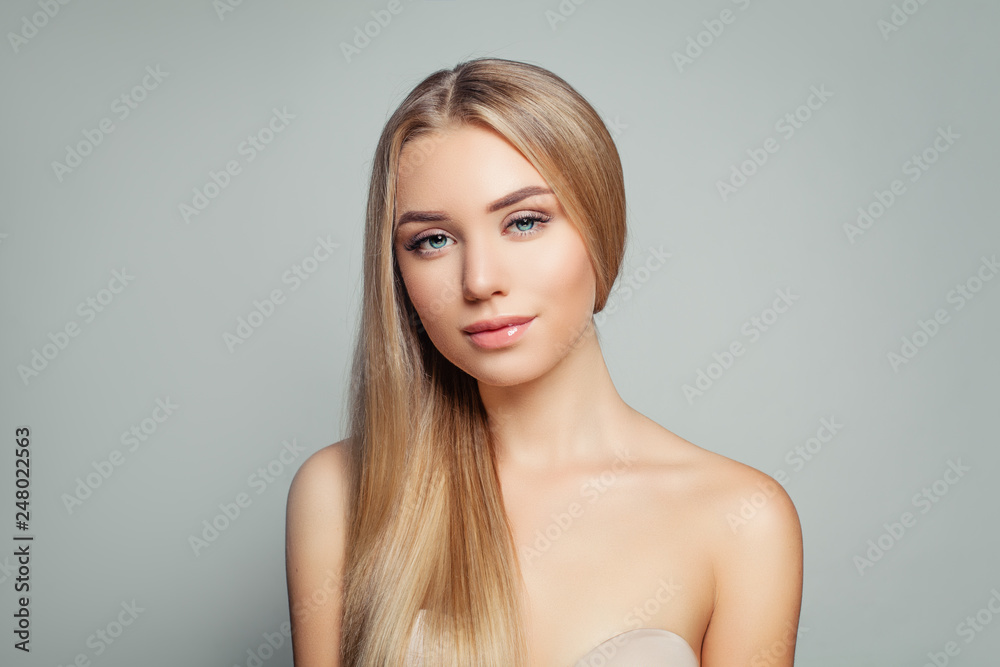 Φωτογραφία Cute woman with long straight blonde hair and  healthy clear skin