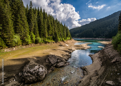 Bolboci lake inside Bucegi mountains , Romania Carpathian mountains photo