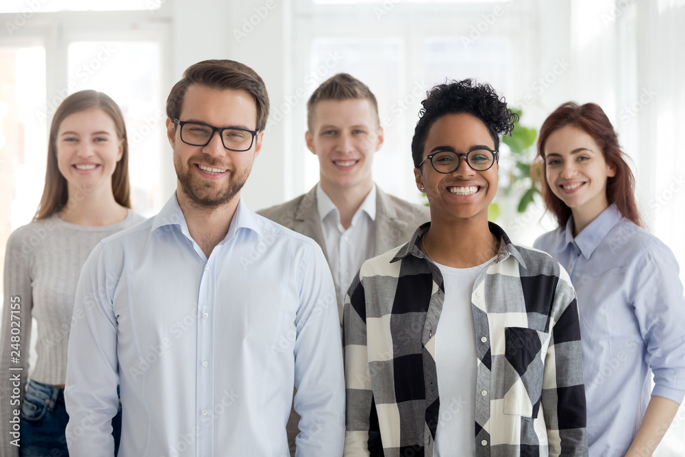 Multiethnic professional leaders and employees looking at camera, portrait Multiethnic professional leaders and employees looking at camera, portrait