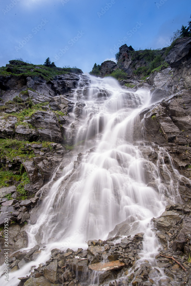 Waterfall in Transfagarasan mountains , Romania 