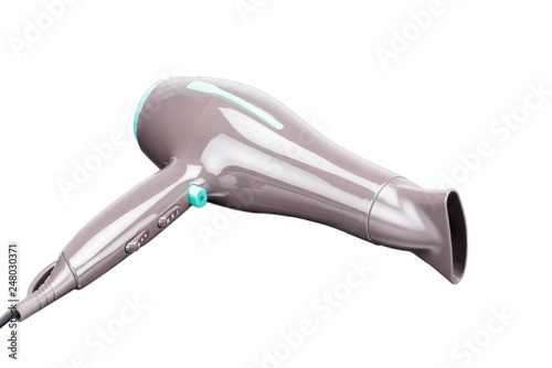 Brown hair dryer with concentrator isolated on the white background