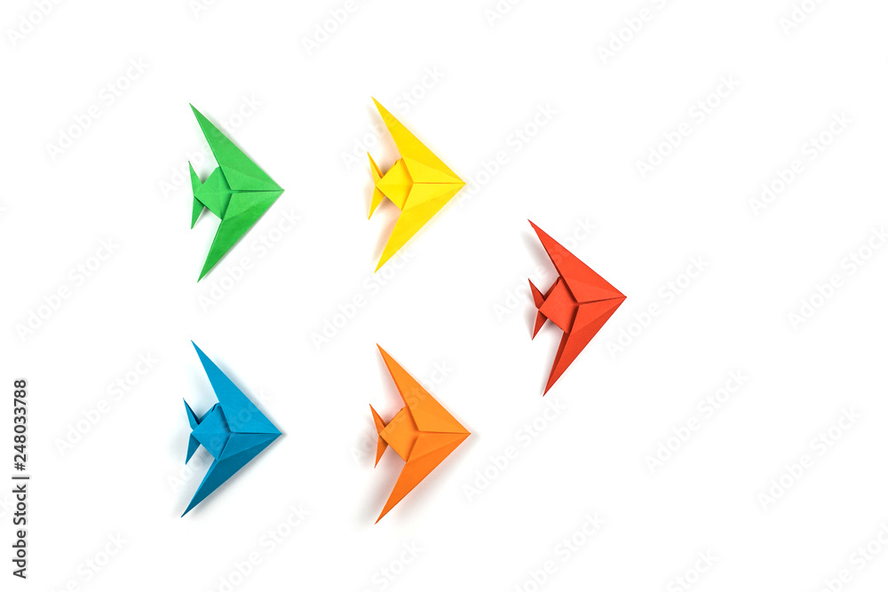 Paper origami fishes isolated on white background. Paper origami fishes isolated on white background.