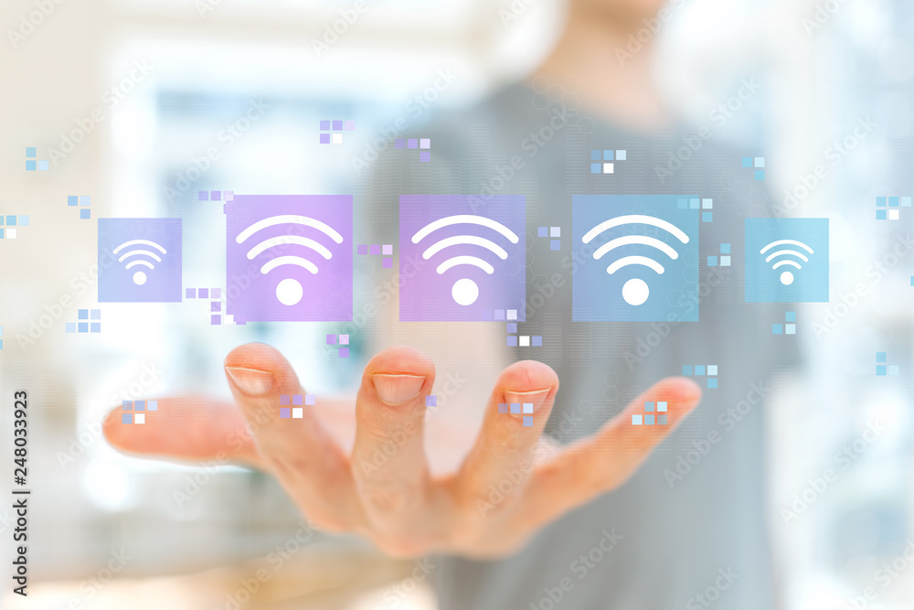 Wifi concept with young man holding his hand Wifi concept with young man holding his hand