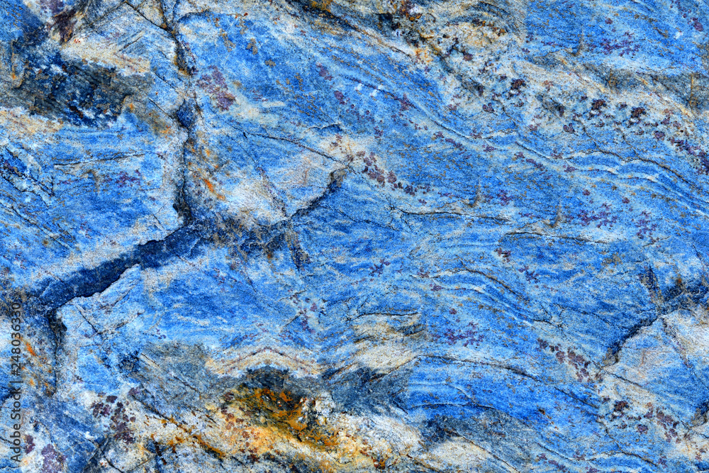 stone texture with deep cracks blue-gray macro, seamless texture