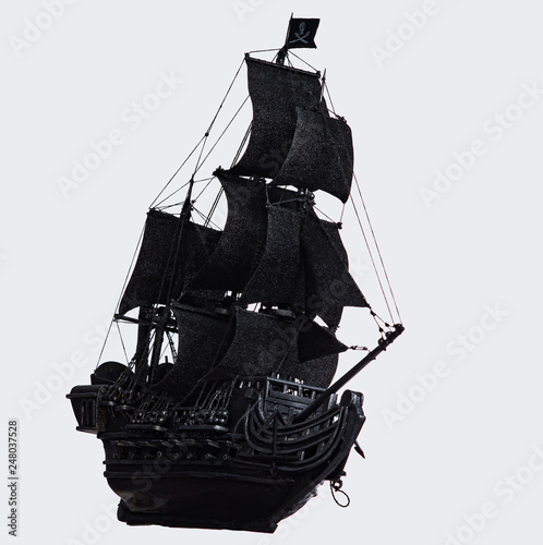 Black pirate ship of the eighteenth century with guns on white background