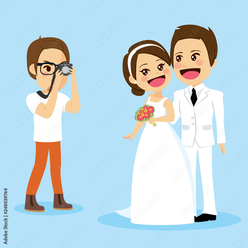 Cute newlywed couple in white dress on wedding day standing posing for photo session by professional photographer Cute newlywed couple in white dress on wedding day standing posing for photo session by professional photographer