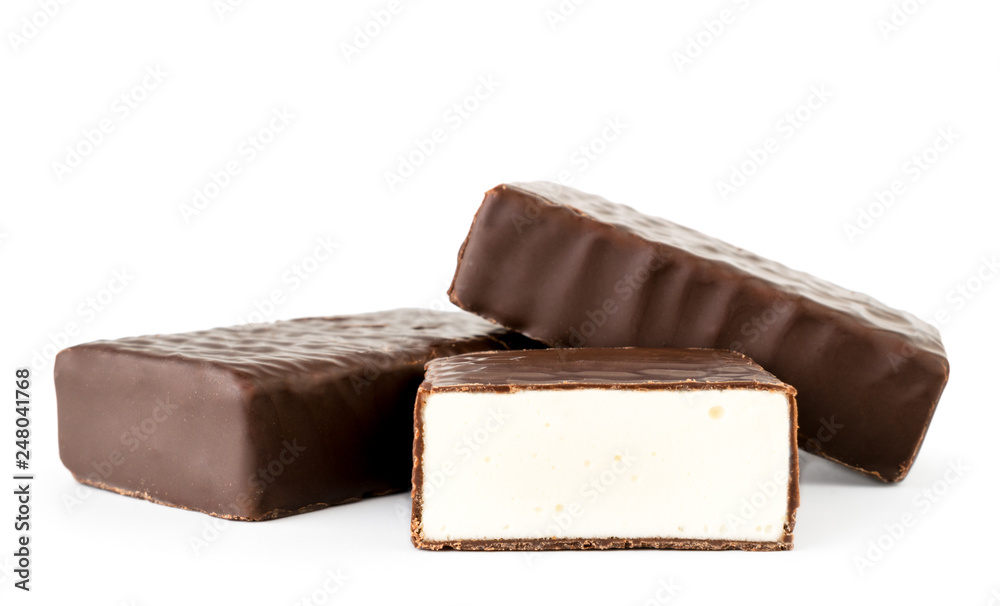 Candy souffle in chocolate and half on a white. Isolated. Candy souffle in chocolate and half on a white. Isolated.