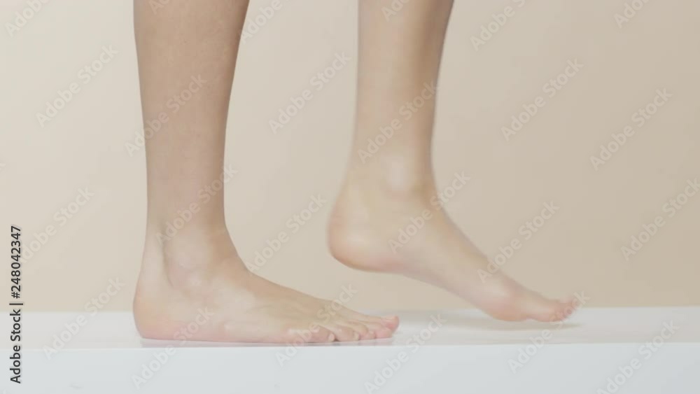Female feet walking on a white surface, recorded Red Monstro and using Briese Focus 140 HMI. Female feet walking on a white surface, recorded Red Monstro and using Briese Focus 140 HMI.
