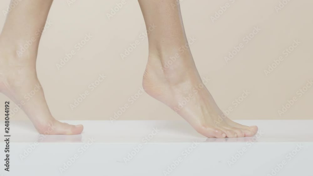 Female feet walking on a white surface, recorded Red Monstro and using Briese Focus 140 HMI. Female feet walking on a white surface, recorded Red Monstro and using Briese Focus 140 HMI.