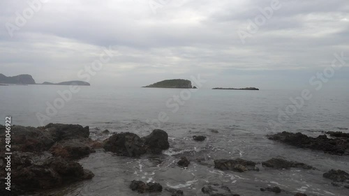 The coast in the sea of Santa Eulalia a cloudy day, Ibiza photo