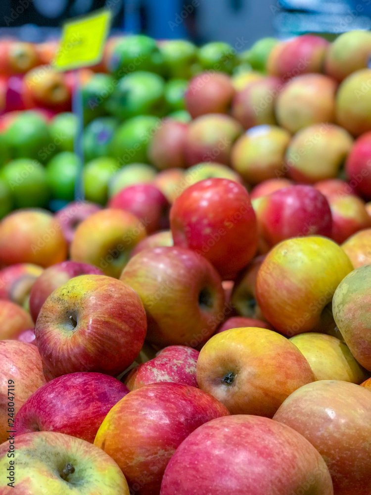 Green and red apples on sale of fruits Green and red apples on sale of fruits