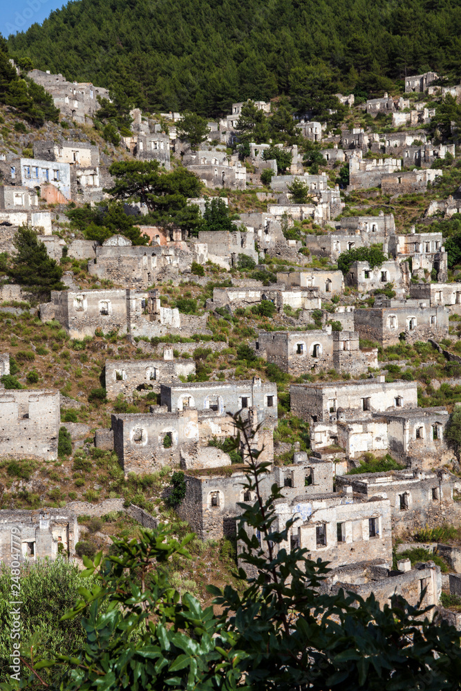 The abandoned Greek Village of Kayakoy, Fethiye, Turkey. Old greek houses, kaya koy near Mediterranean coast. 