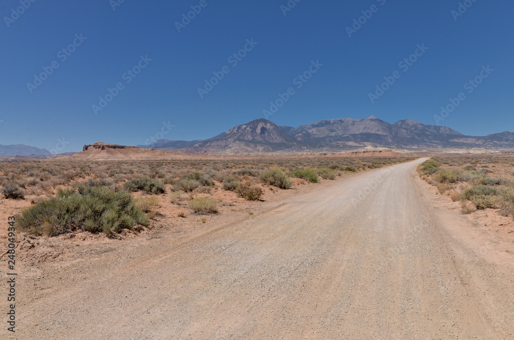 primitive dirt road leading to the Henry Mountains near Hanksville, Wayne County, Utah primitive dirt road leading to the Henry Mountains near Hanksville, Wayne County, Utah
