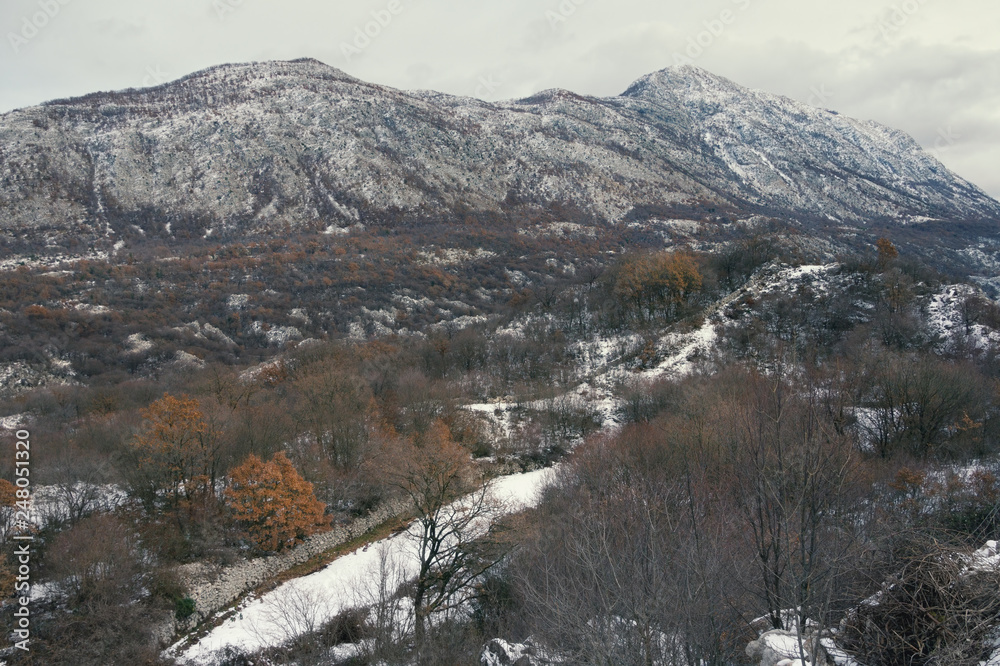 Mountain landscape on cloudy winter day. Dinaric Alps, Montenegro, Sitnica region