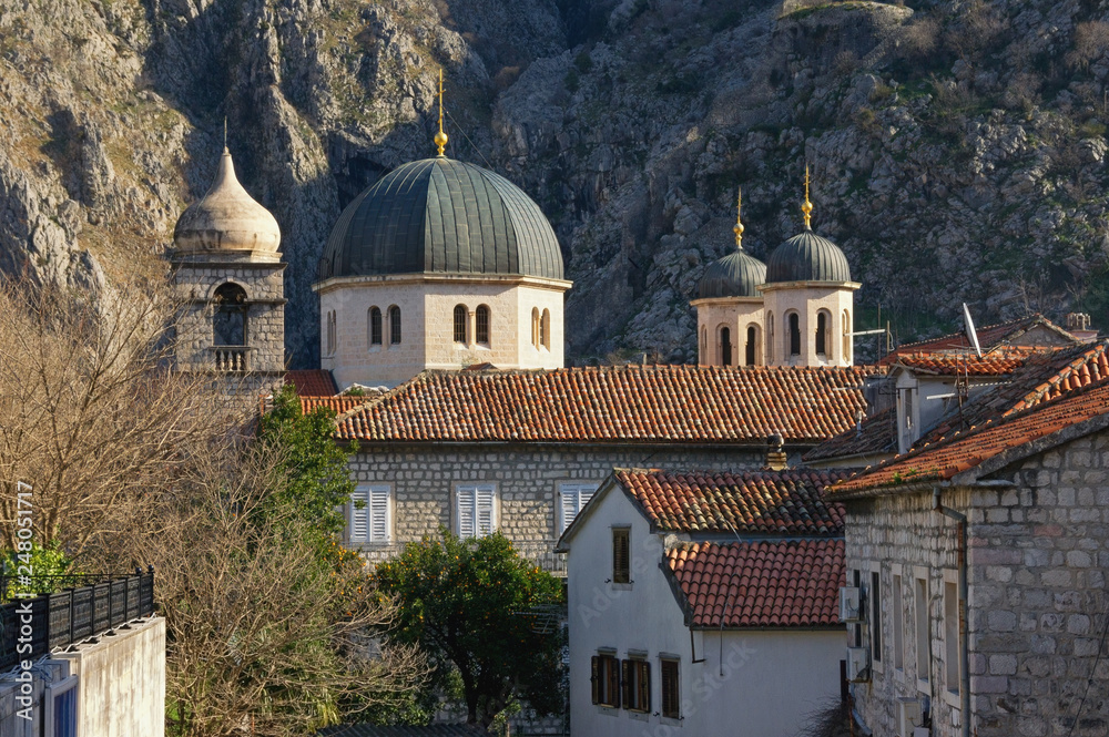 Montenegro. View of Old Town of Kotor,  UNESCO World Heritage Site. Sunny winter day. Domes of St. Nicholas Church