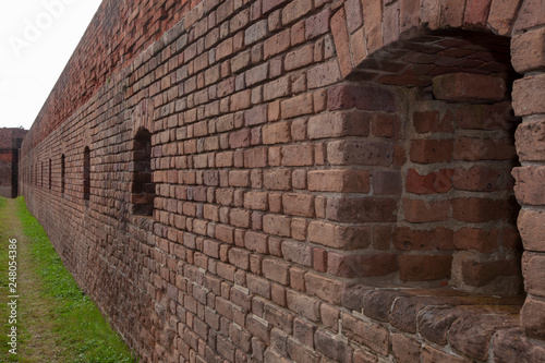 brick wall with ports photo