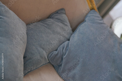grey pillows on the sofa © goldeneden