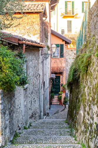 Beautiful picturesque and colorful old town street in Bellagio city, Como lake, Italy
