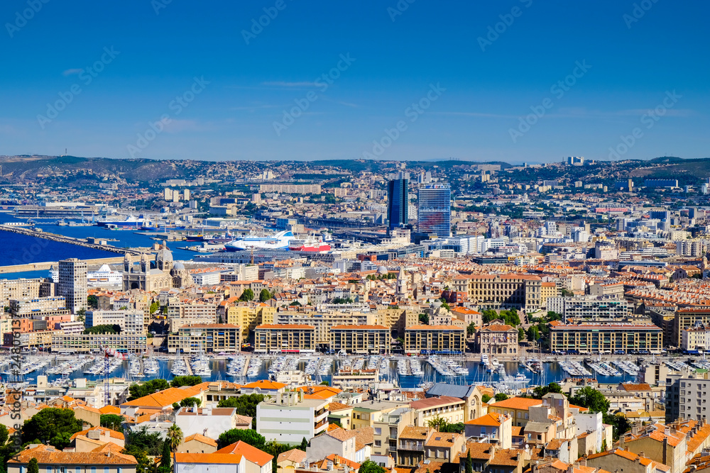Panoramic view of Marseille, embankment, Old Port and town roofs. Vieux-Port de Marseille, France.