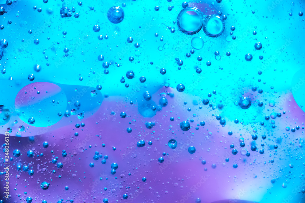 Water and oil bubble background. Macro shot of beautiful Water and oil bubble background , with small and big bubbles