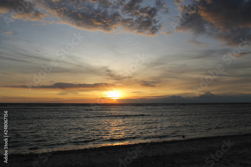 GILI TRAWANGAN  INDONESIA - December 02  2013  Sunset  at the Beach of Gili Trawangan. The biggest of the three popular Islands near Lombok  Indoniesia.