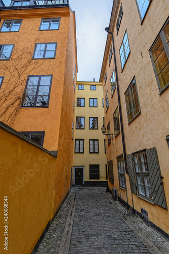 Sweden quaint cobblestone street in picturesque Gamla Stan  Stockholm s oldest neighborhood.