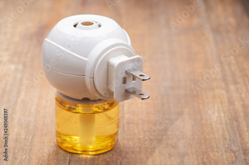 Fotografie Anti-stress and calming plug-in diffuser used for pets, including dogs, cats, rabbits, rodents, and horses