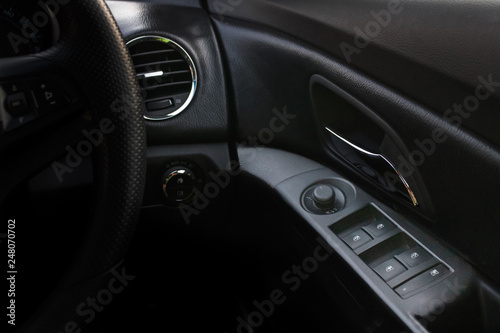 Electronic car's windshield adjustment knobs and joystick of Chevrolet cruise on driver seat. Bangkok, Thailand November 20, 2017 © xzotica65