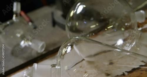 Close-up of scientific chemglasses arranged on table 4k photo