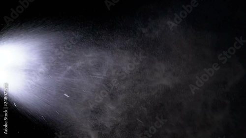 Water Spray against Black Background. Slow Motion photo
