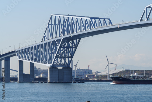 Tokyo Gate Bridge over a Ship in Japan. © bigterry
