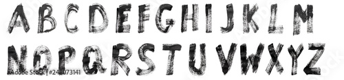 English alphabet written in black paint on a white isolated background.