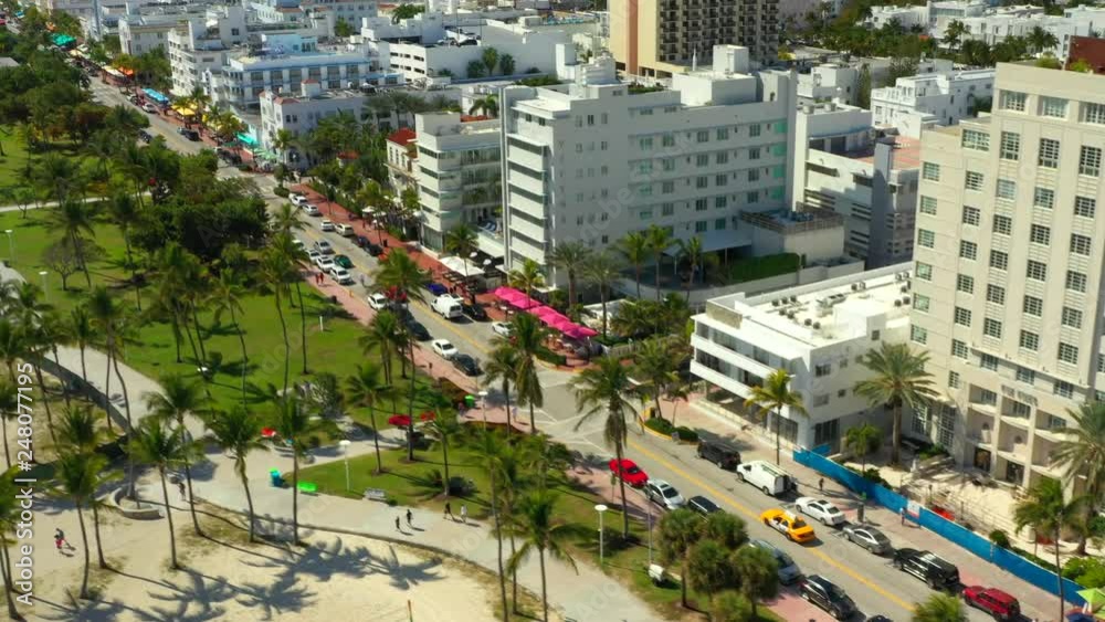Tourism arriving in Miami Beach summer vacation aerial drone footage