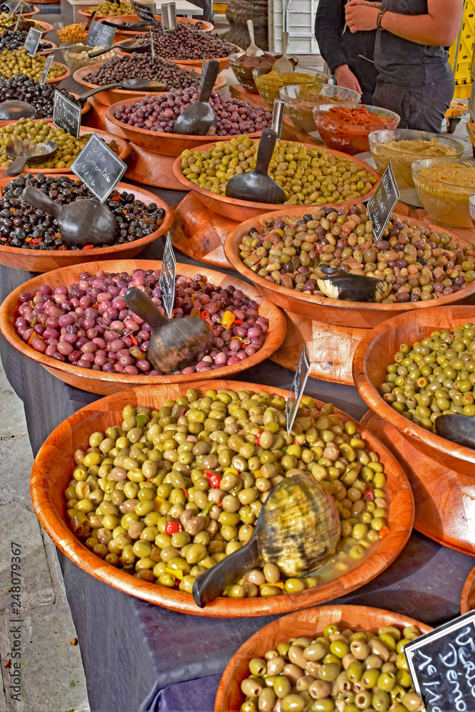 Olives of every kind for sale at the Ajaccio, Corsica outdoor market. Olives of every kind for sale at the Ajaccio, Corsica outdoor market.