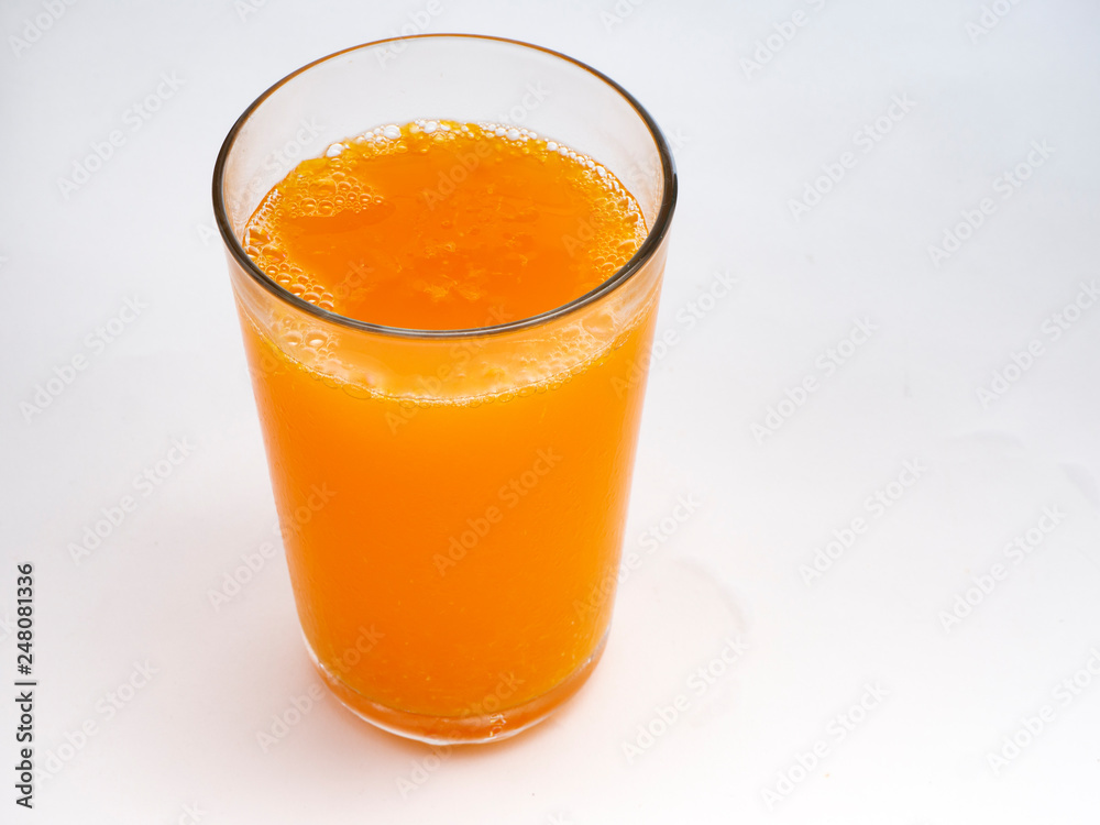 Glass of orange juice on white Glass of orange juice on white