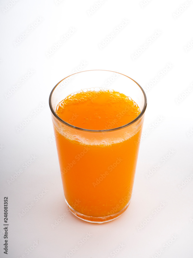Glass of orange juice on white Glass of orange juice on white